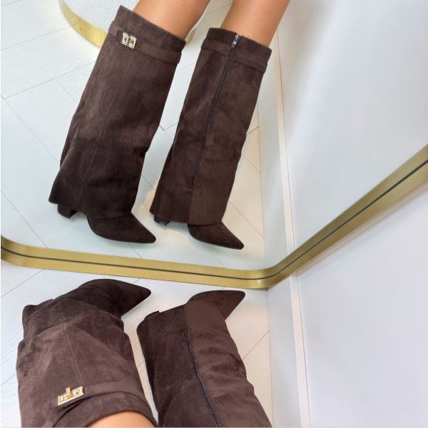 Black knee-high wedge boots structured silhouette with supportive elevated sole for modern women