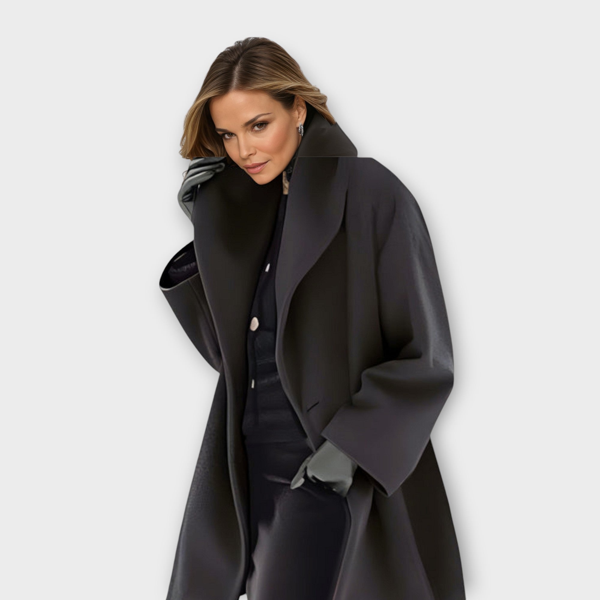 Women's oversized winter coat with wide collar, chic layering style in cozy warm fabric