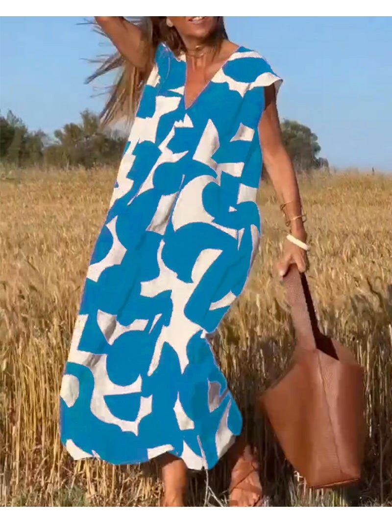 Women's relaxed abstract print dress, loose airy silhouette with bold contemporary pattern for vacation