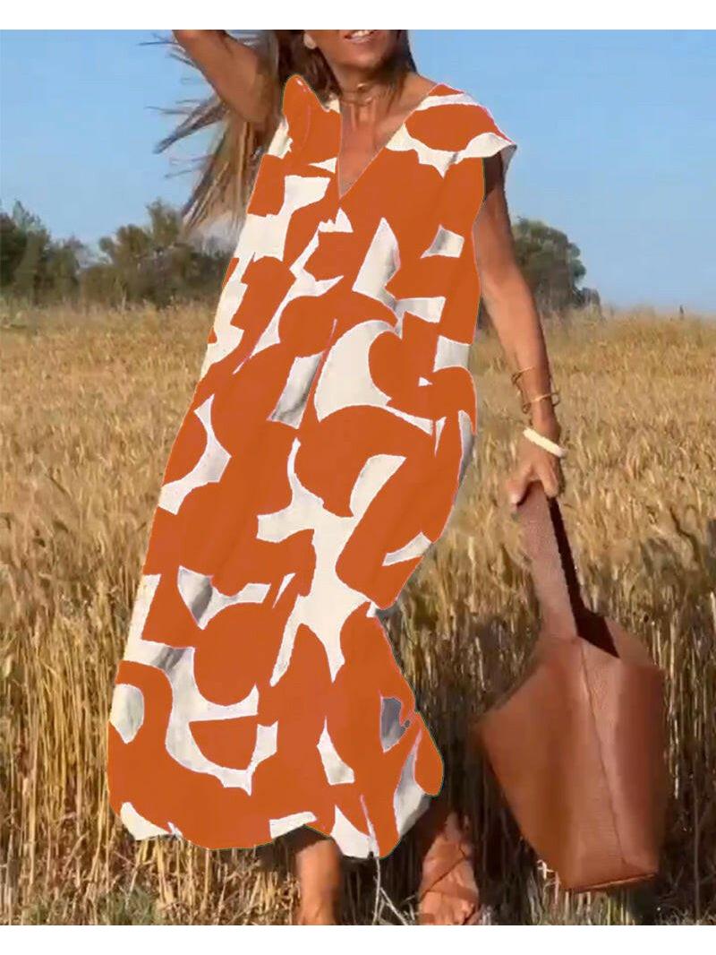 Women's relaxed abstract print dress with breezy loose silhouette, bold contemporary pattern for vacation