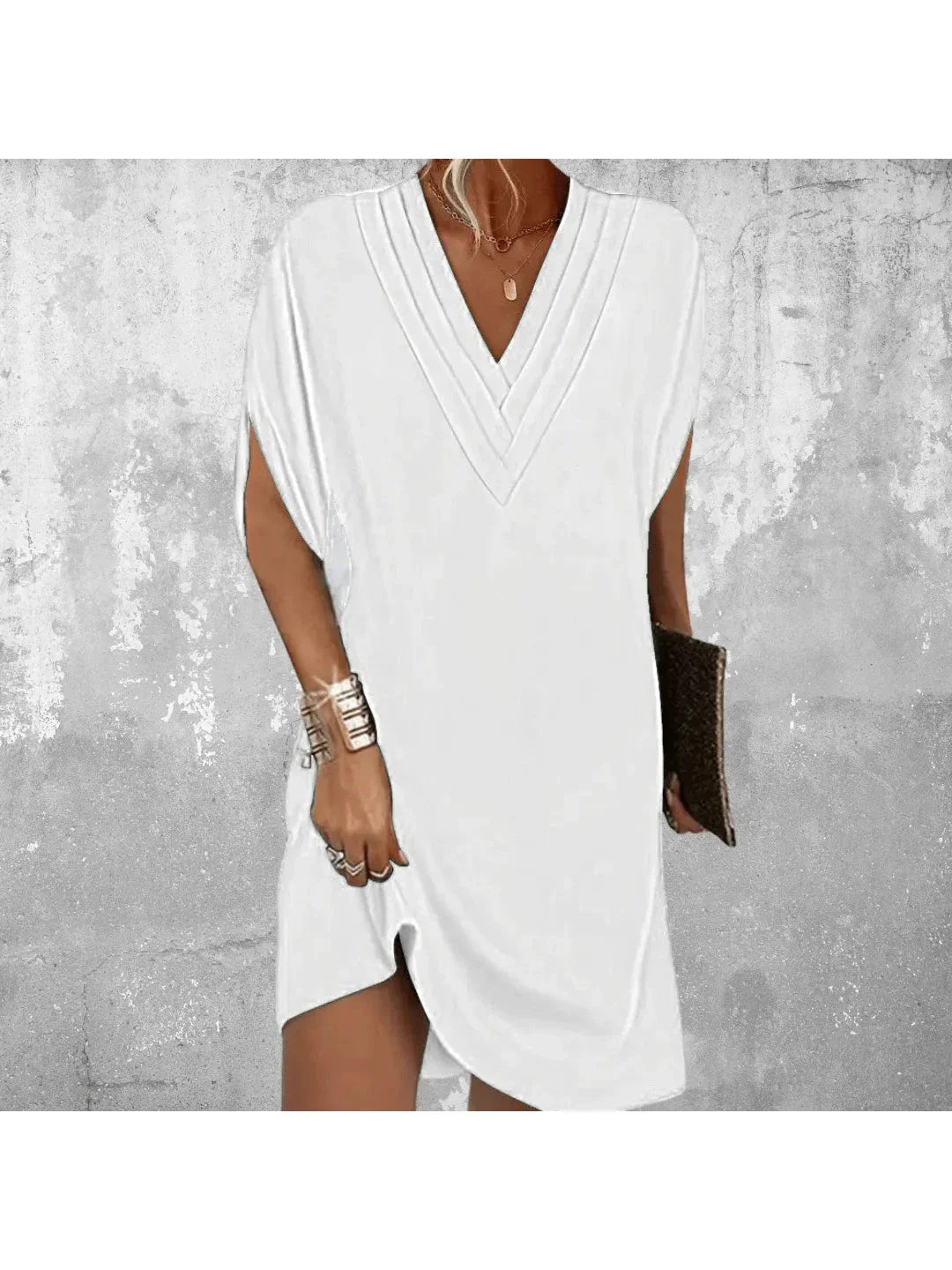 Elegant V-neck shift dress with tummy-covering silhouette in lightweight fabric for day-to-night wear