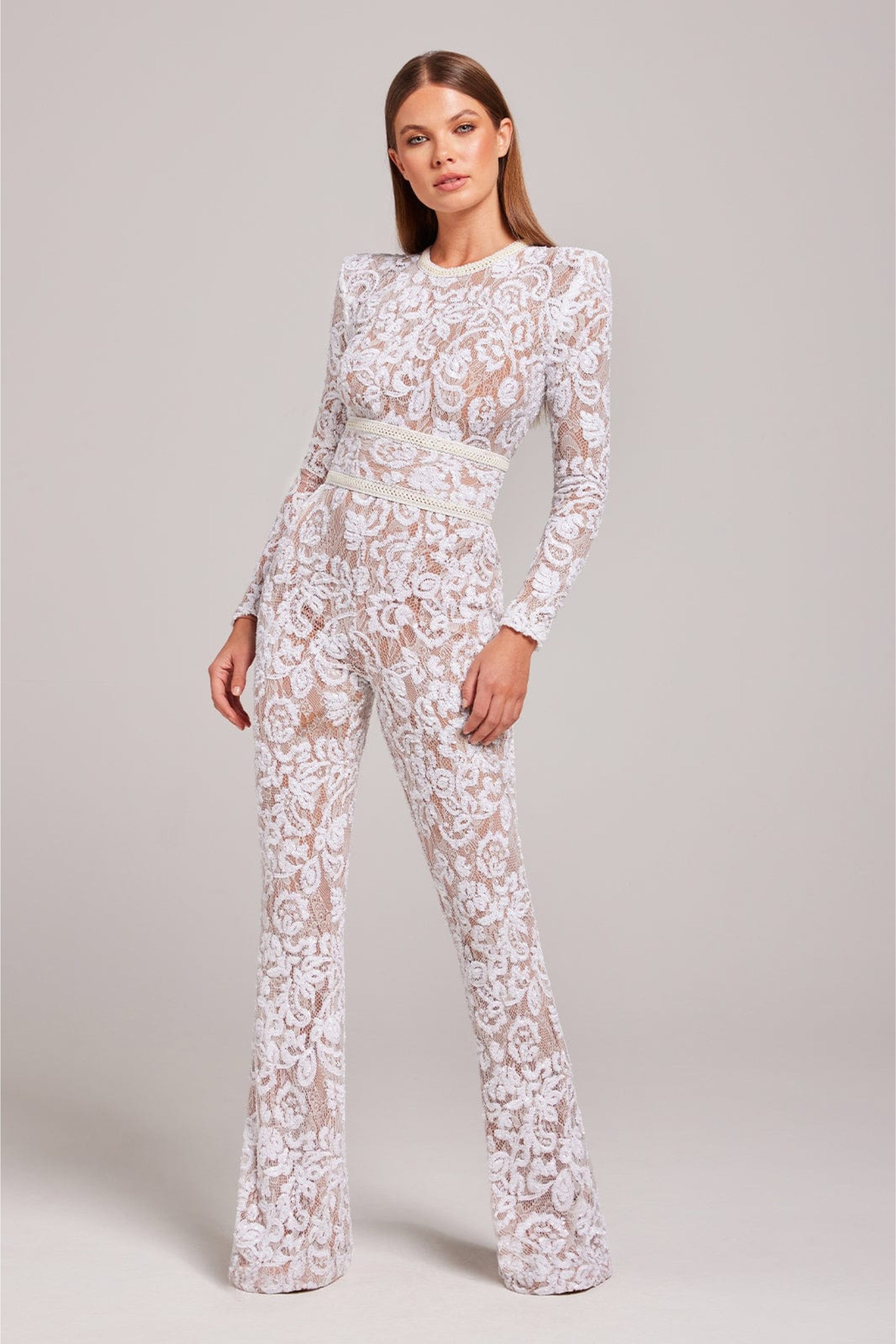 Women's black lace jumpsuit elegant evening wear with intricate appliqué details and flattering silhouette