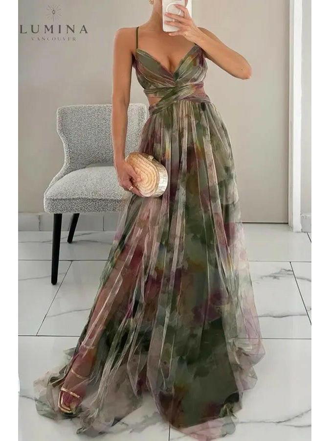 Women's floral maxi dress with draped silhouette, lightweight print fabric and adjustable back detail