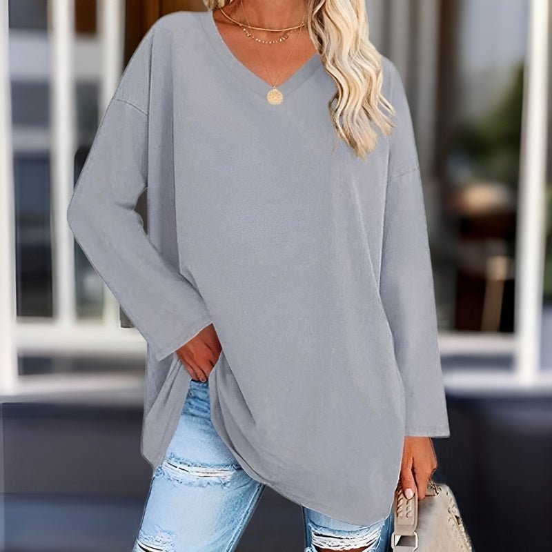 Women's relaxed draped V-neck tunic top with dropped shoulders for breathable everyday layering