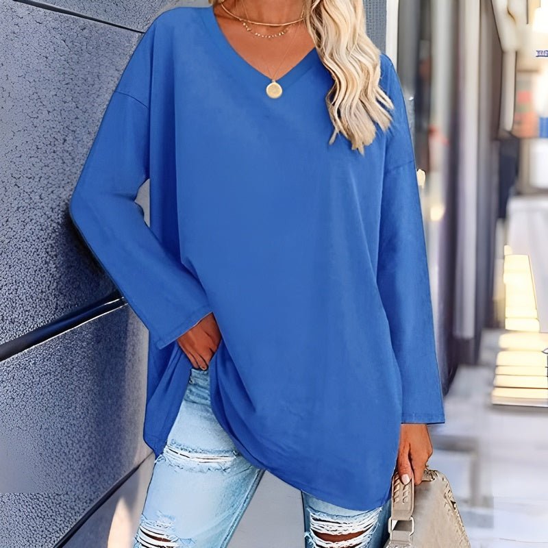 Women's relaxed v-neck tunic top with draped silhouette and dropped shoulders for effortless layering
