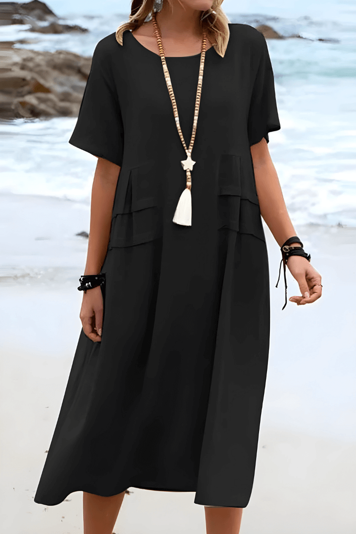 Women's relaxed fit linen dress in natural tones, casual everyday style with side pockets