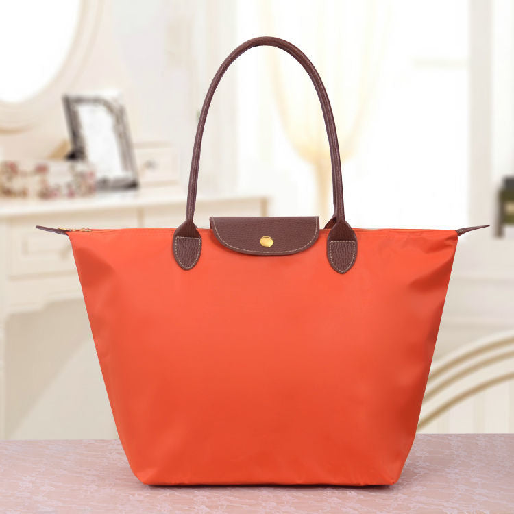 Large structured women's tote bag elegant designer shoulder bag spacious everyday carry durable