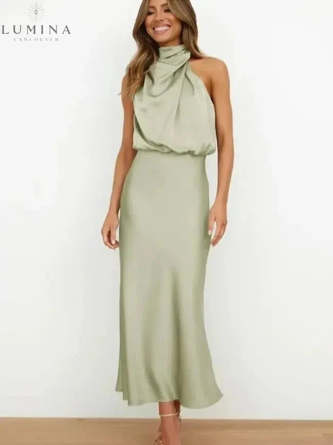 Black off-shoulder cocktail dress with lustrous finish, refined silhouette for glamorous eveningwear