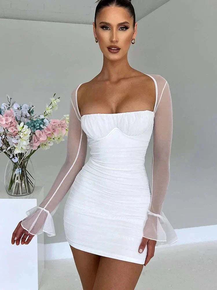 Black bodycon mini dress ruched silhouette sheer sleeves form-fitting stretch fabric night out glam