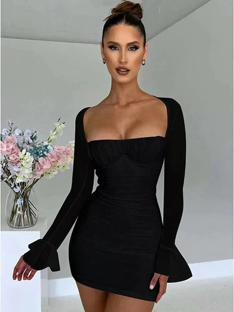 Black bodycon mini dress ruched silhouette sheer sleeves night out glam fitted stretch