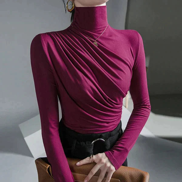 Beatrix white pleated turtleneck blouse elegant tailored fit with graceful draped silhouette