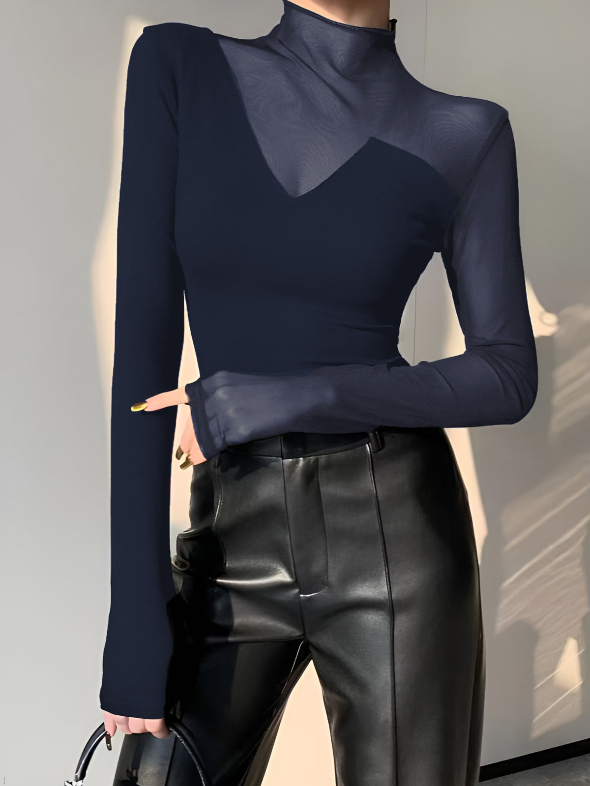 Women's asymmetrical long sleeve top with sheer mesh panels, soft viscose-cotton blend workwear style