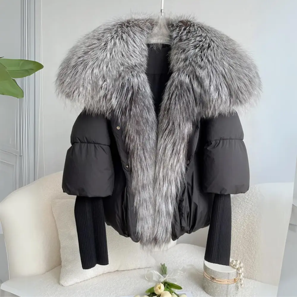 Women's black puffer jacket with soft faux fur collar, down-filled insulation, cozy winter style