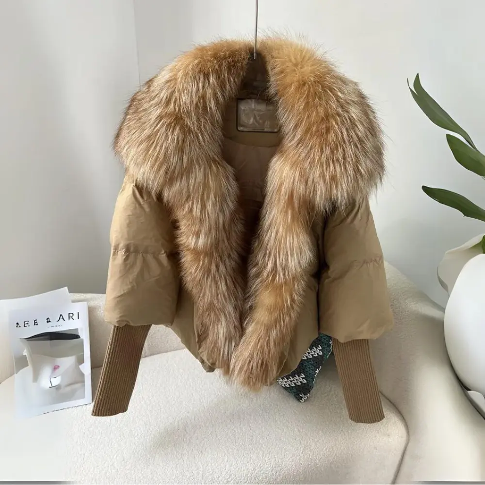 Women's black puffer jacket with soft faux fur collar, down filling, cozy winter style