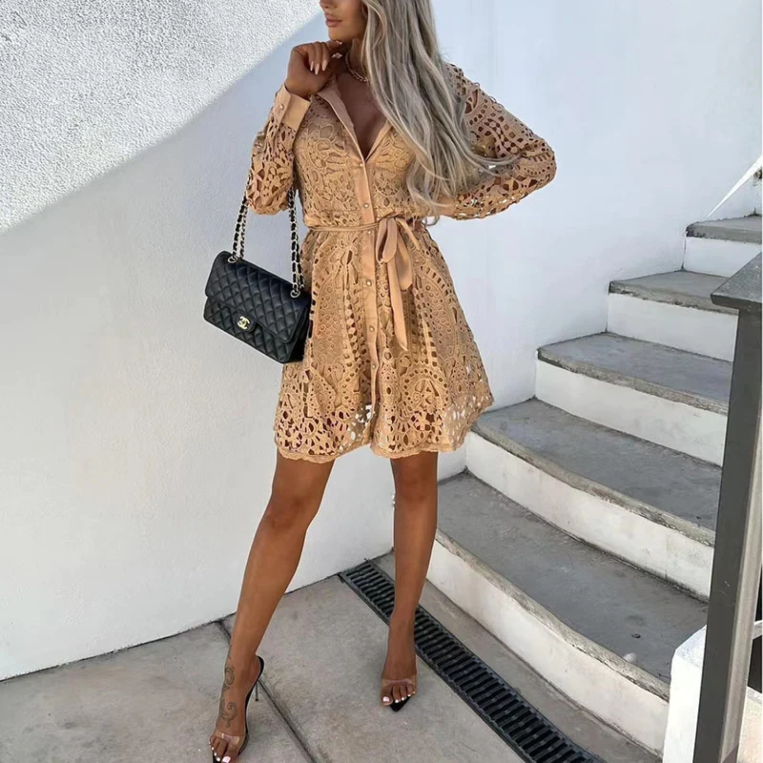 White knee-length lace shirt dress with button-front, crochet detail, and waist belt for hourglass silhouette