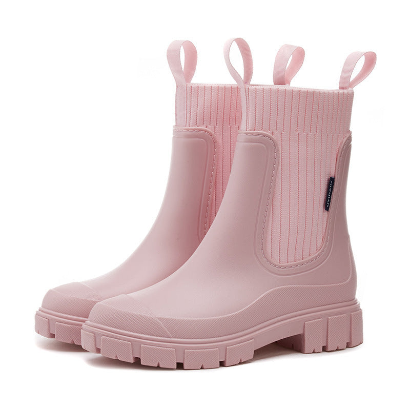 Waterproof rubber Wellington rain boots with non-slip sole, durable all-weather outdoor footwear