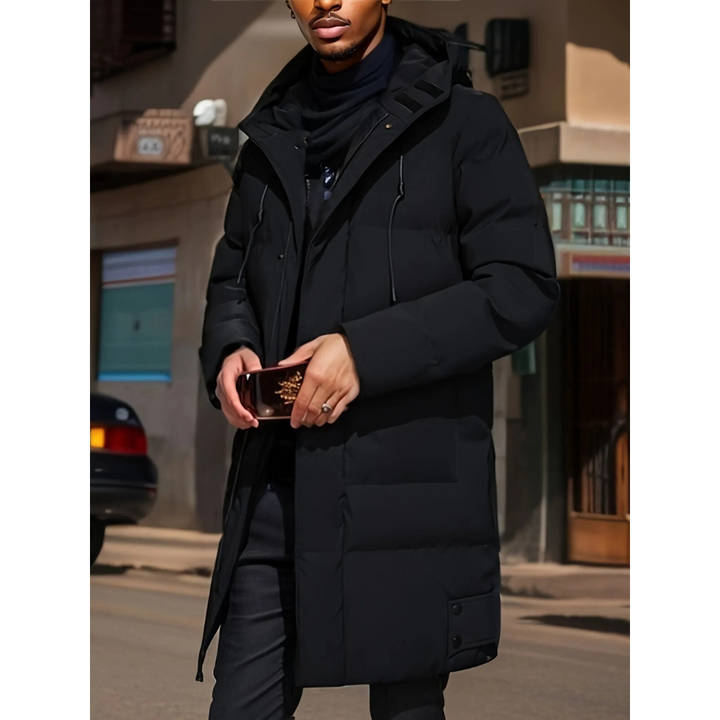 Men's insulated hooded winter coat long cut dark urban silhouette maximum warmth modern style