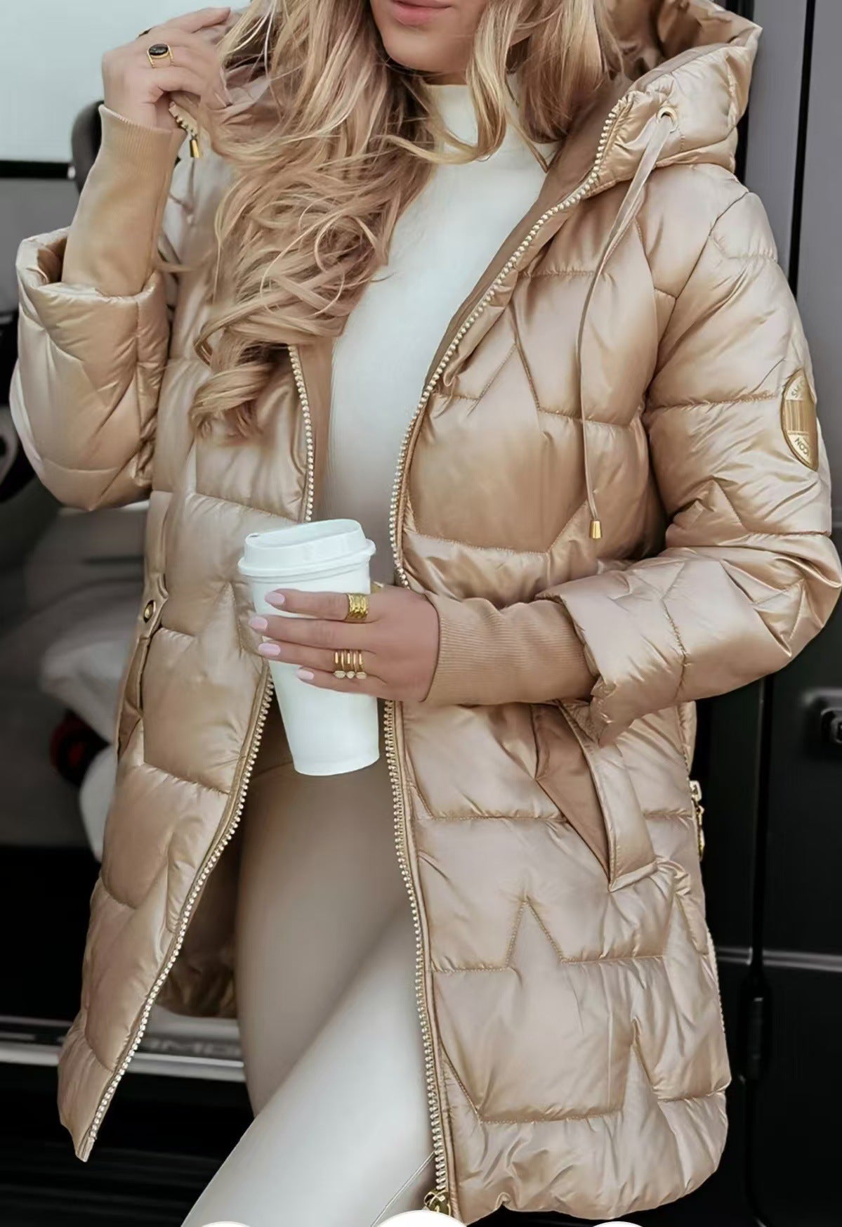 Women's black hooded winter coat sleek fit with lightweight insulation and clean minimalist lines