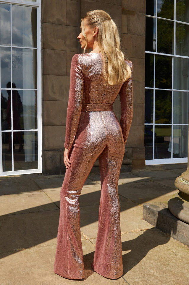 Women's sparkling jumpsuit glamorous sculpted silhouette one-piece with elegant flattering cut for evenings