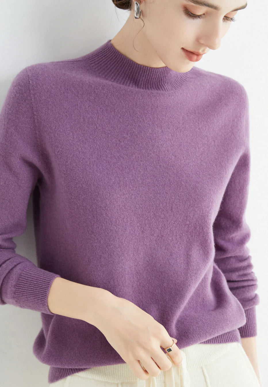 Women's elegant knit sweater soft luxurious fabric classic flattering silhouette for all occasions