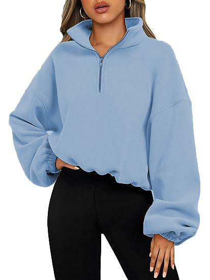 Women's relaxed fit half-zip sweatshirt with stand-up collar for sporty street style comfort
