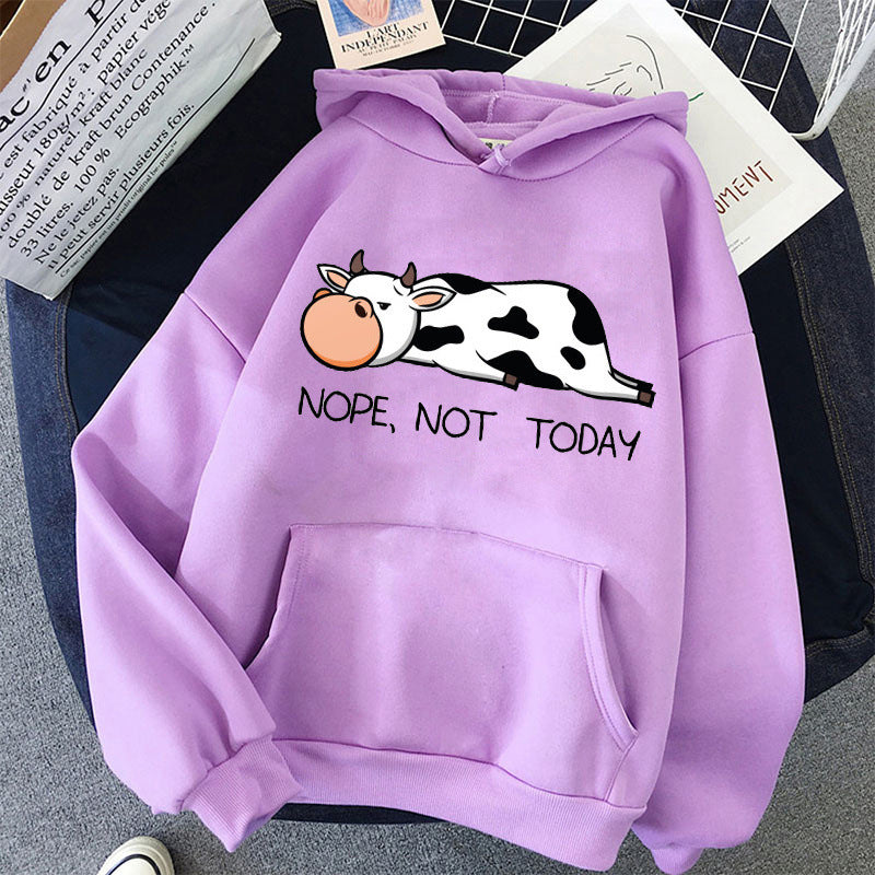 Women's relaxed-fit hoodie with funny sleeping cow print and "Nope Not Today" graphic in cozy fleece