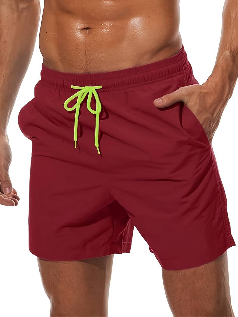Men's relaxed fit swim trunks with integrated mesh liner for beach and pool all-day comfort