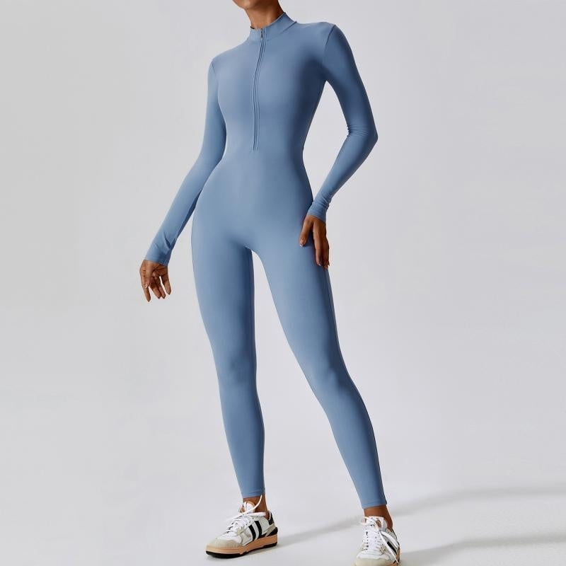 Women's seamless sports jumpsuit in neutral tone, slim athletic cut with friction-free yoga design