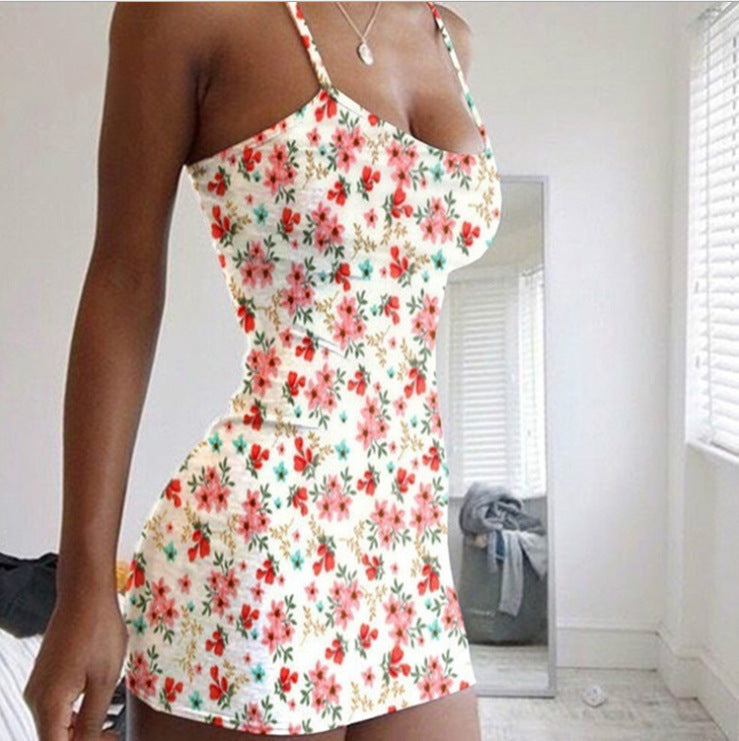Pink floral bodycon mini dress with spaghetti straps, stretchy polyester blend for sunny days