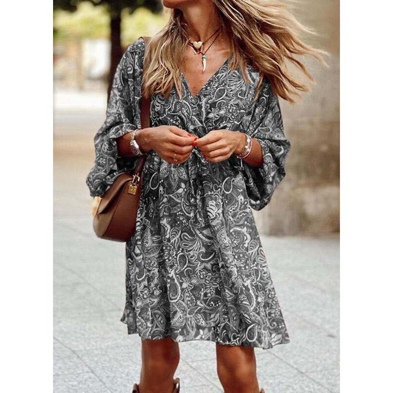Women's bohemian summer dress, relaxed flowy silhouette in soft tones, sustainable everyday style