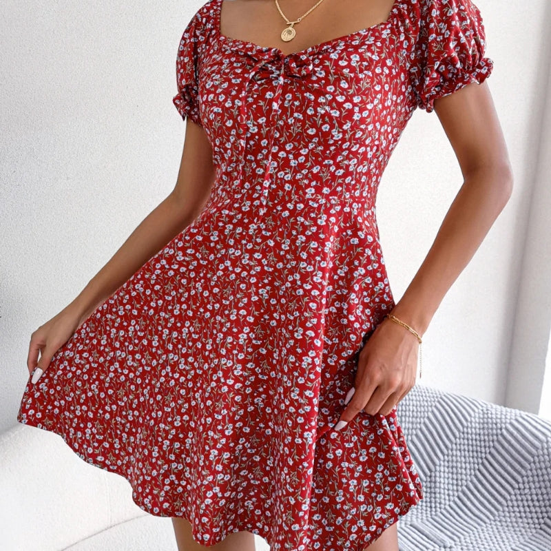 Women's floral midi dress cinched waist flowing hem vintage-inspired silhouette summer style
