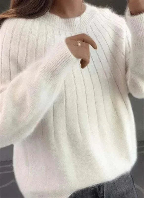 Women's fluffy knit sweater in soft neutral tone, vertical ribbed texture, cashmere-like silky comfort