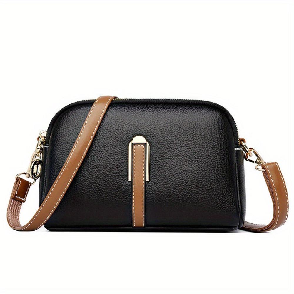 Elaine black vegan leather crossbody bag with gold-tone hardware and adjustable strap