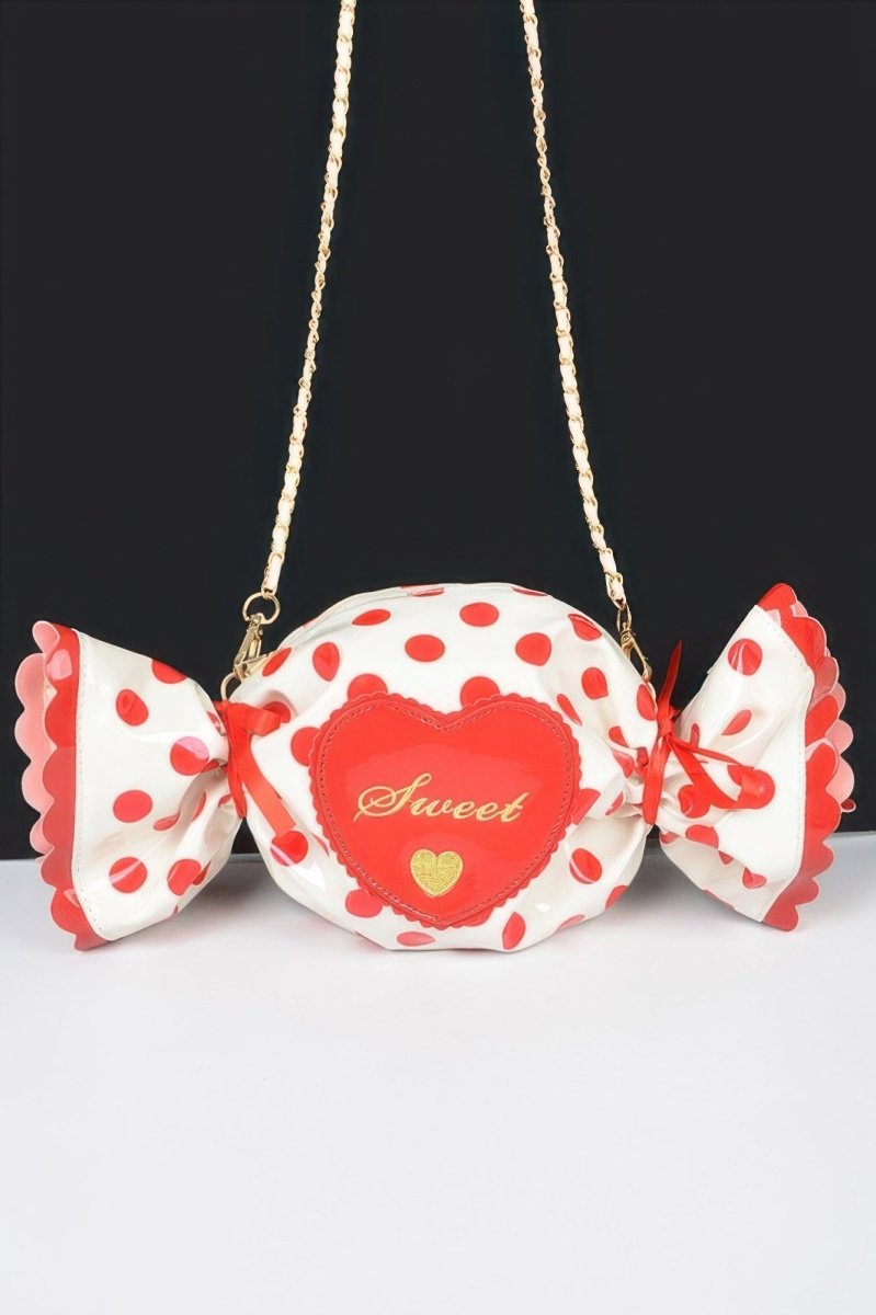 Candy-inspired structured polka dot novelty bag with top handle, bold print, event-ready fashion accessory