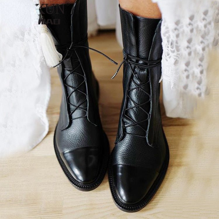 Women's black vegan leather lace-up winter boots with plush lining and luxurious cushioned footbed