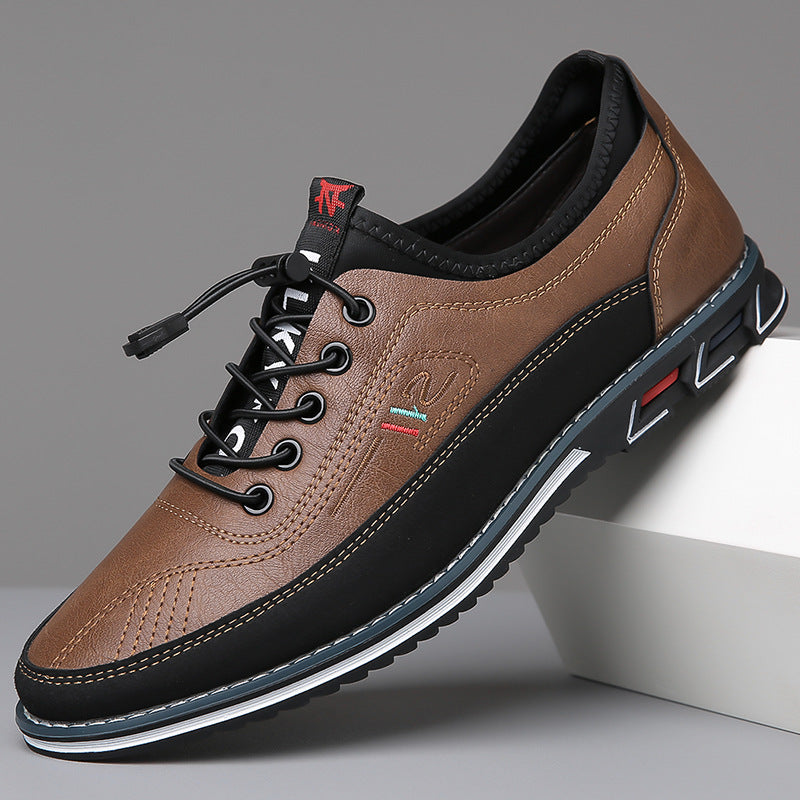 Two-tone casual sneakers with toggle laces, smooth upper, tonal stitching, modern low-top silhouette