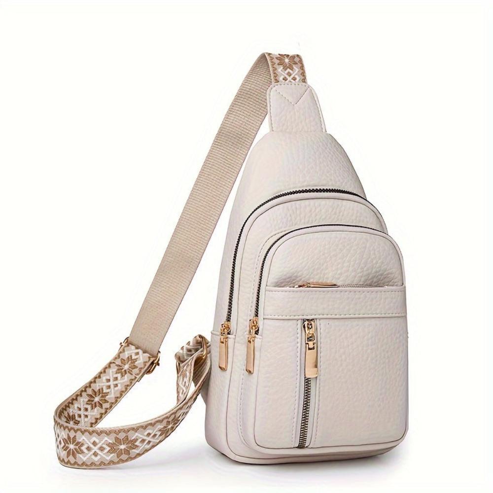 Elise black grain vegan leather women's crossbody bag with top zip closure, compact and elegant