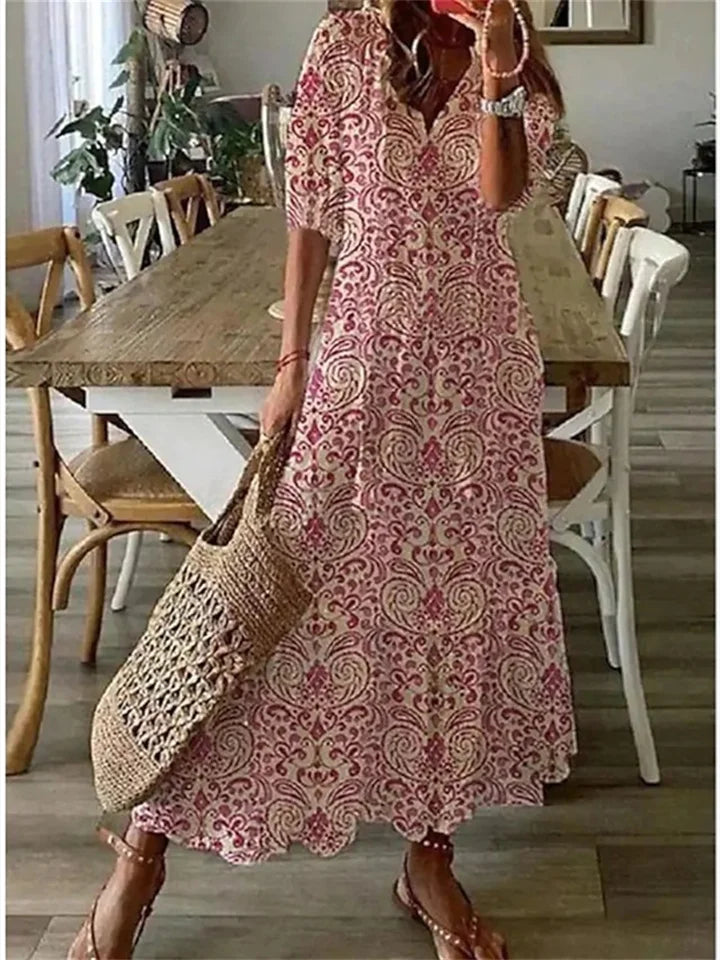 Women's floral maxi dress boho chic relaxed silhouette V-neck tassel ties elbow sleeves airy fabric