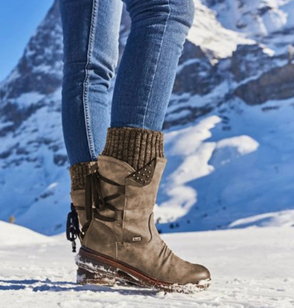 Women's purple leather insulated ankle boots with cozy knit trim detail for winter