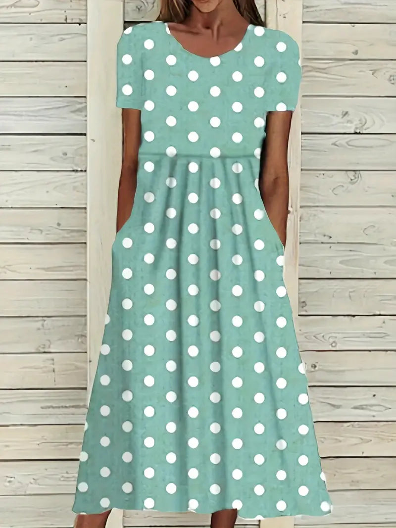 Women's black white polka dot midi dress retro chic mid-calf silhouette vintage-inspired spring style