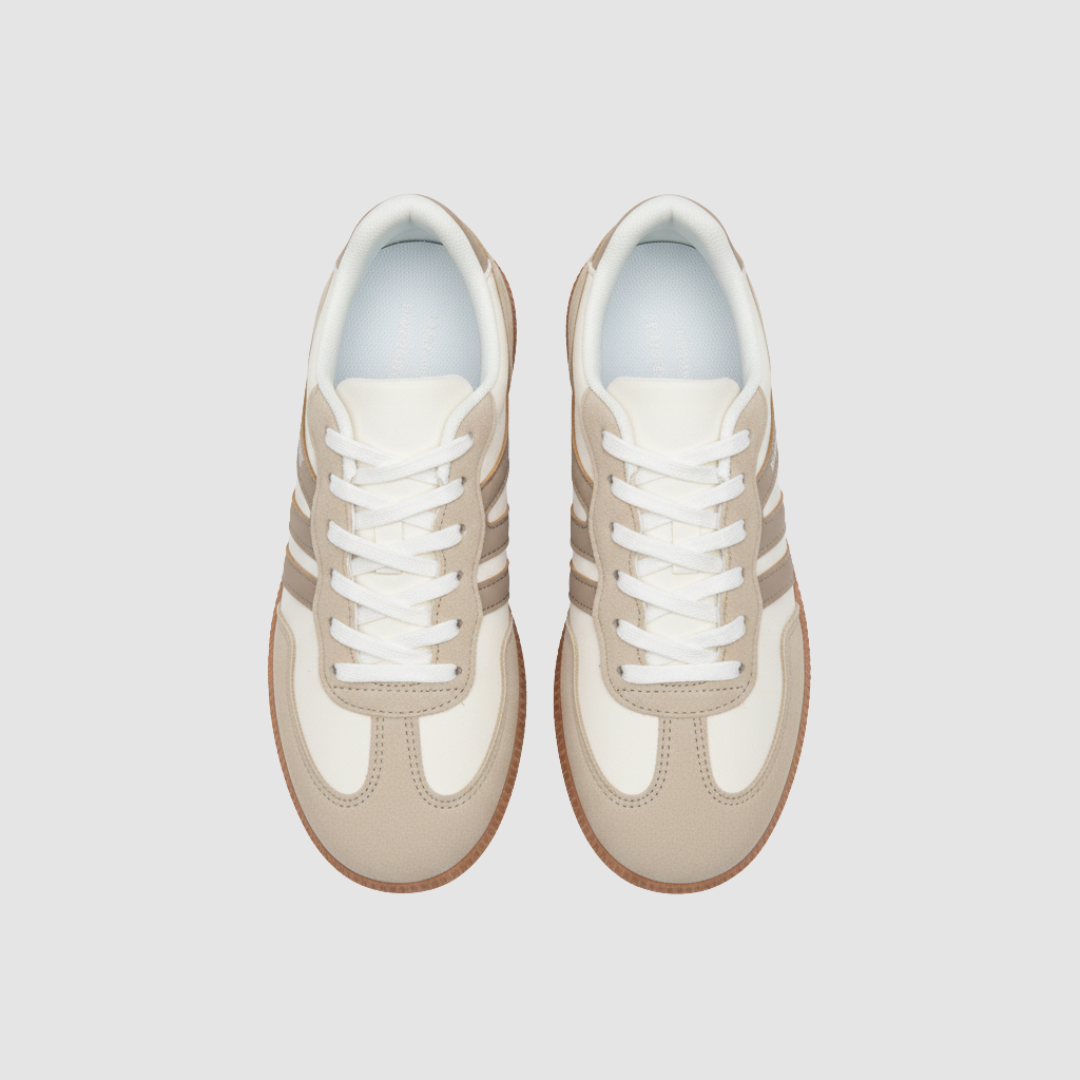 Women's lace-up sneakers with bold side stripes, rubber sole, clean silhouette for everyday comfort