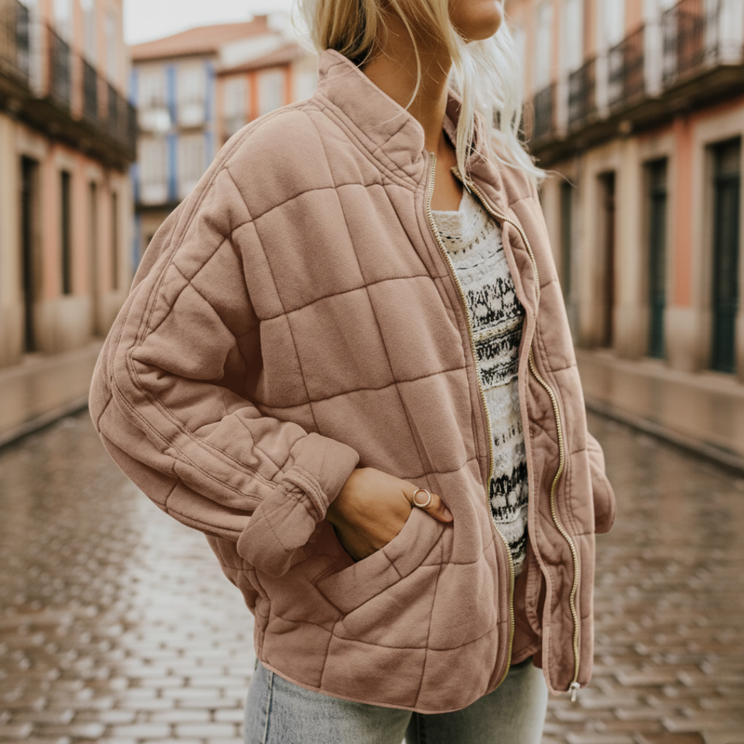 Women's beige padded jacket with central front zip, lightweight casual outerwear with modern silhouette
