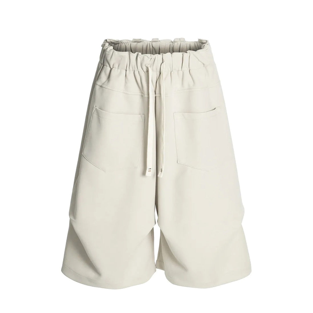 Men's relaxed knee-length cotton-blend shorts neutral tone refined detailing Riders Collection casual style