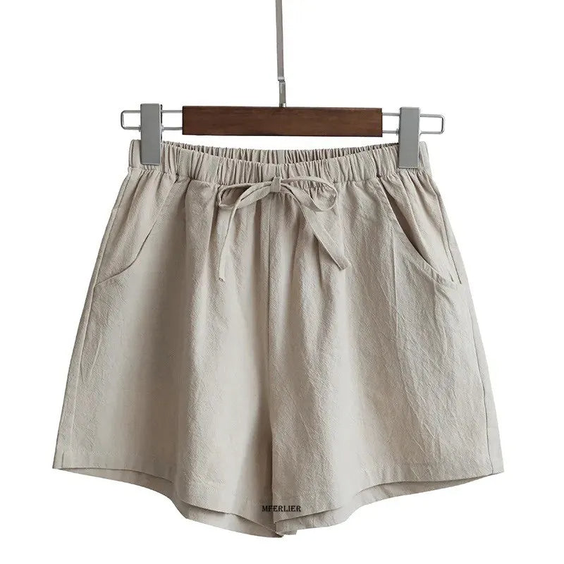 Plus size high-waisted linen blend shorts in neutral tones, vintage-inspired silhouette with breathable cotton fabric