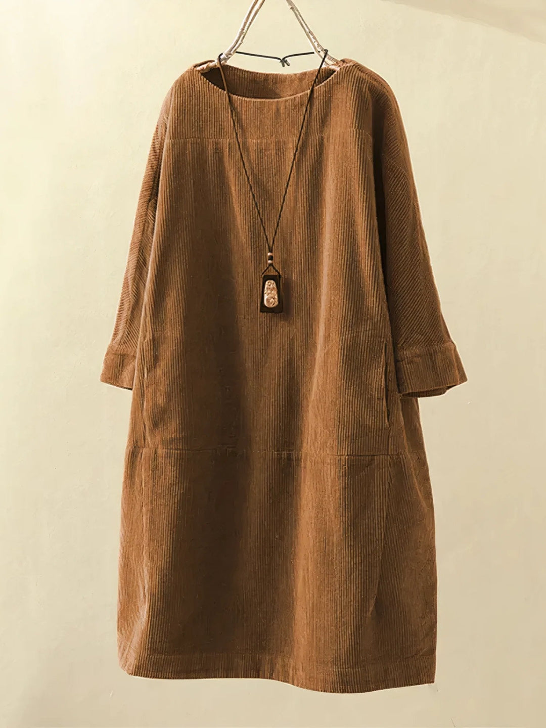 Women's sleeveless knee-length breathable summer dress in solid color with light airy silhouette