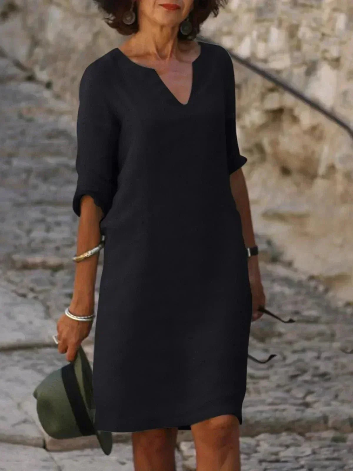 Women's relaxed midi dress with soft V-neck, fluid draping, three-quarter sleeves, effortless everyday style