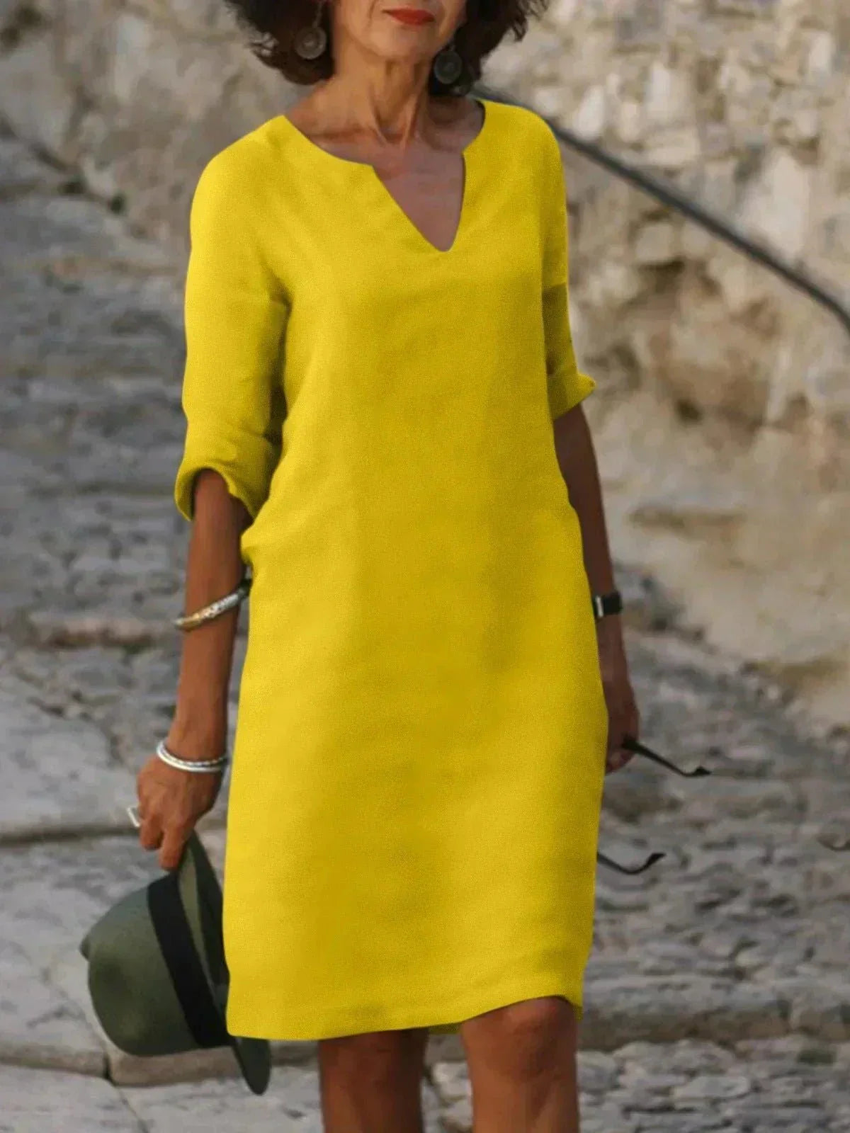 Women's relaxed V-neck dress in casual silhouette with flattering elongating neckline