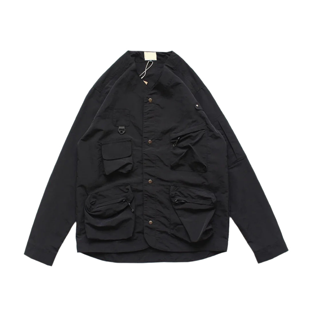 Lightweight nylon field jacket shirt with dual front pockets and slightly rounded hem for outdoor wear