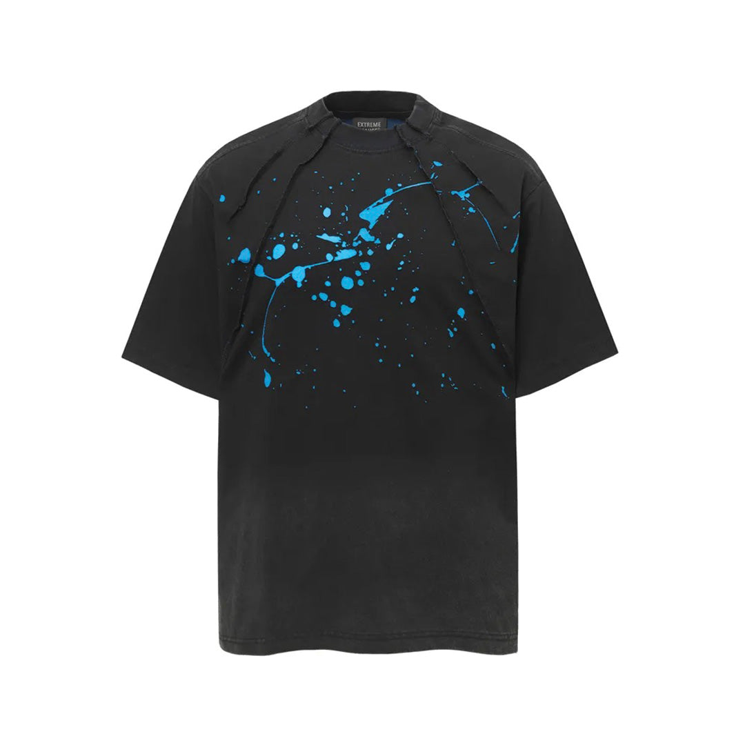 Black streetwear cotton tee with hand-printed splatter graphic, jagged seams, and faded dystopian finish