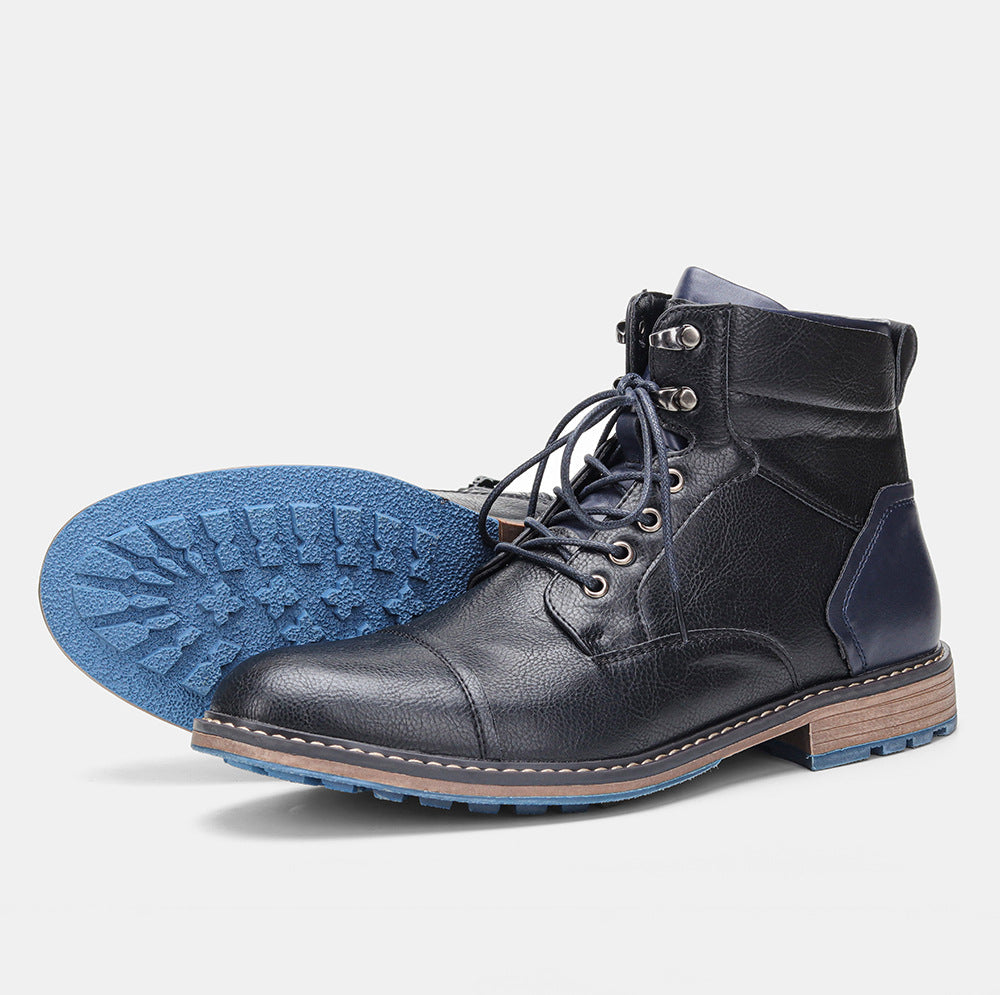 Men's cap toe weather-resistant synthetic leather boot with blue traction outsole, rugged urban style
